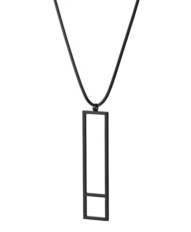 side view of Black rectangular pendant on a thin black cord from the KONZUK Artus collection