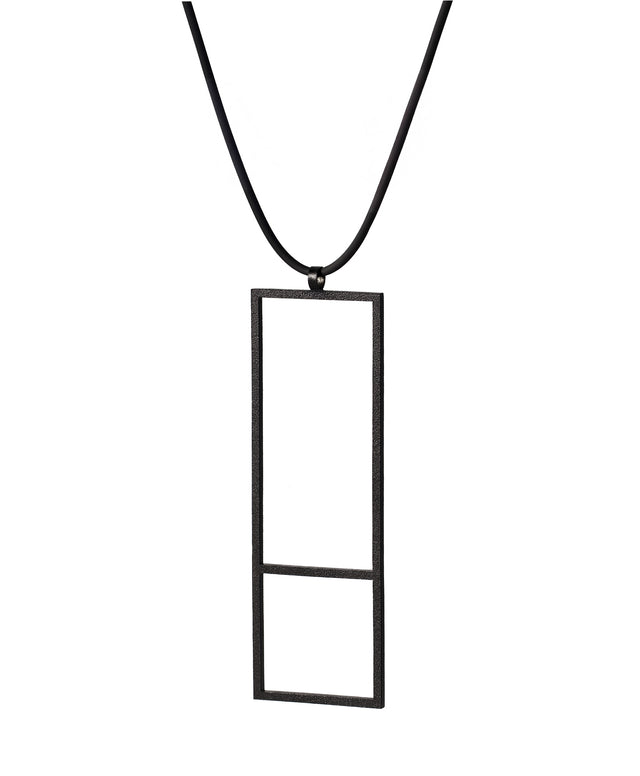 side view of a minimalist sculptural necklace that is rectangular and geometric from the KONZUK Artus collection