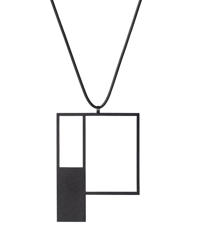 minimalist sculptural black powder coated necklace with a square geometric form from the Artus collection of KONZUK
