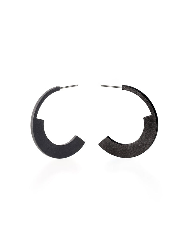 sculptural statement hoop earrings from the KONZUK Artus collection