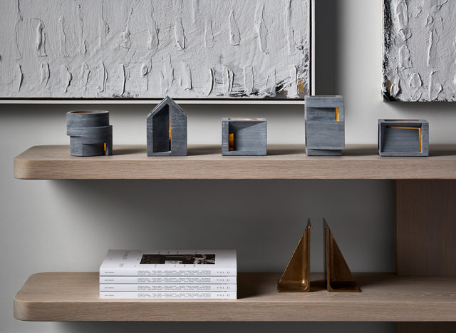 a series of 5 Habitat architectural concrete candle holders from HouseHold by KONZUK