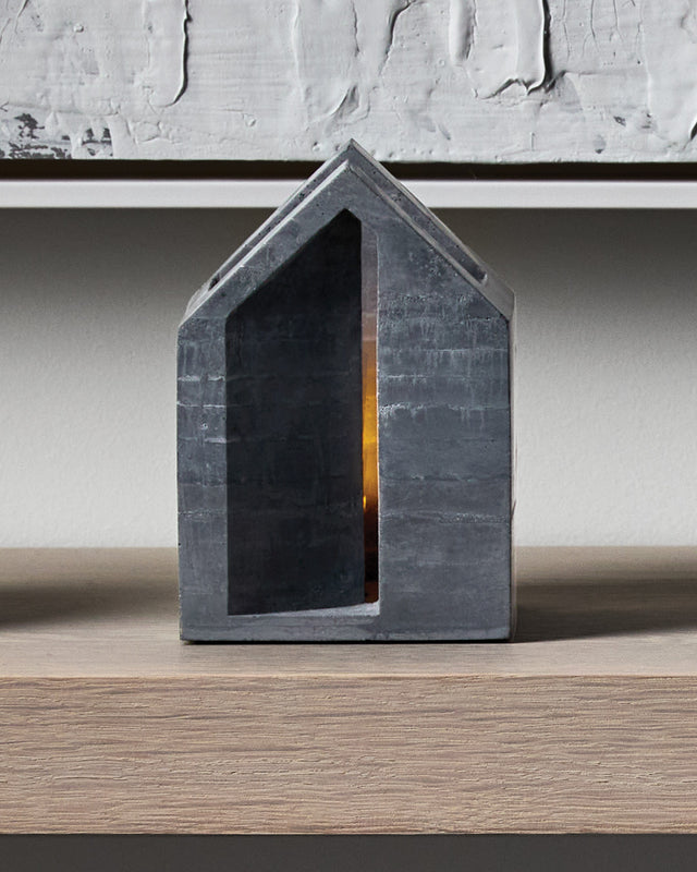 charcoal gray concrete architectural candle holder in a house shape from KONZUK Habitat collection