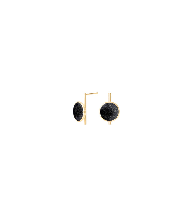 Imagine the path to Jupiter forged by the spacecraft Juno…Measuring only 19.5mm x 13mm, these small Bauhaus inspired black dome earrings are set in brushed 14 karat solid gold, a subtle shimmering detected in the wells of velvety concrete infused with diamond dust. Elegance and timelessness are paired with modernist minimalism. An expression of romance and imagination with high design.