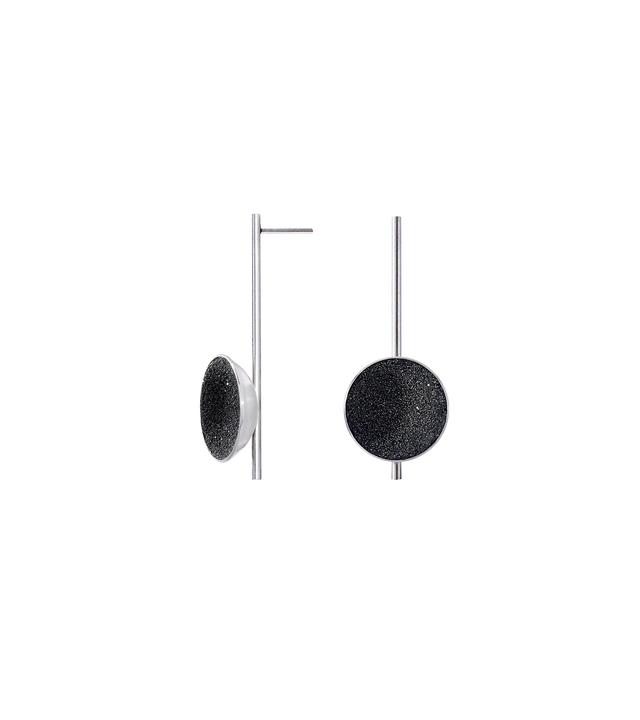Inspira earrings feature authentic diamond dust embedded into a concrete lined stainless steel dome architecturally positioned onto a suspended minimalist steel post.