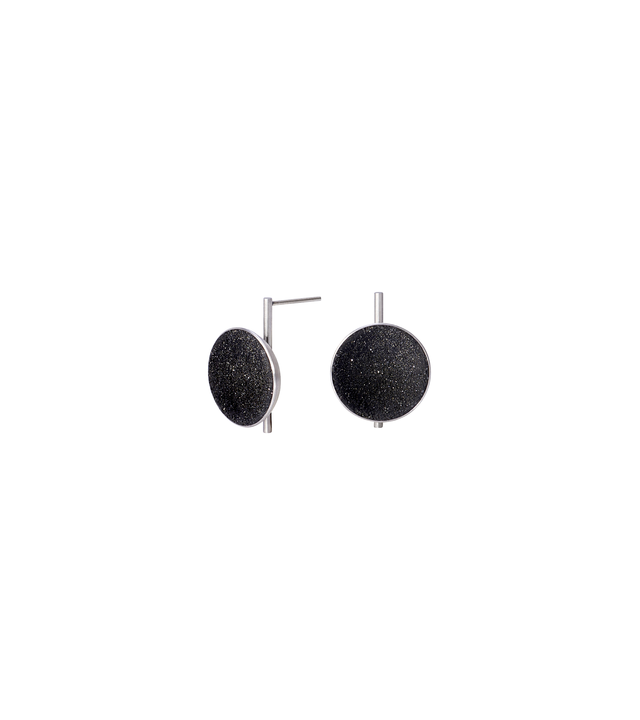 Juno earrings feature authentic diamond dust embedded into a concrete lined stainless steel dome architecturally positioned onto a minimalist steel post.