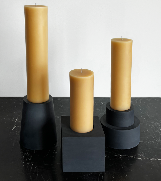 brutalist concrete candle holders with natural beeswax pillar candle from the KONZUK Monument collection