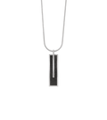 Memento Beholden pendent with diamond dust encrusted concrete set into small rectangular stainless steel design.