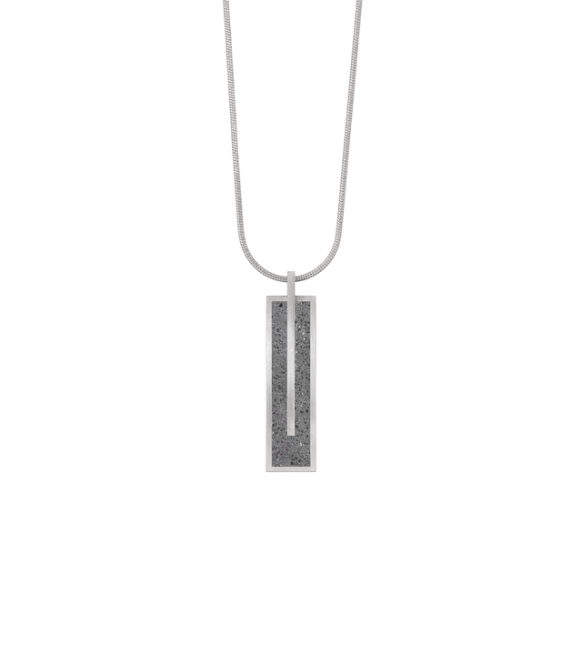Memento Beholden pendent with concrete set into small rectangular stainless steel design.