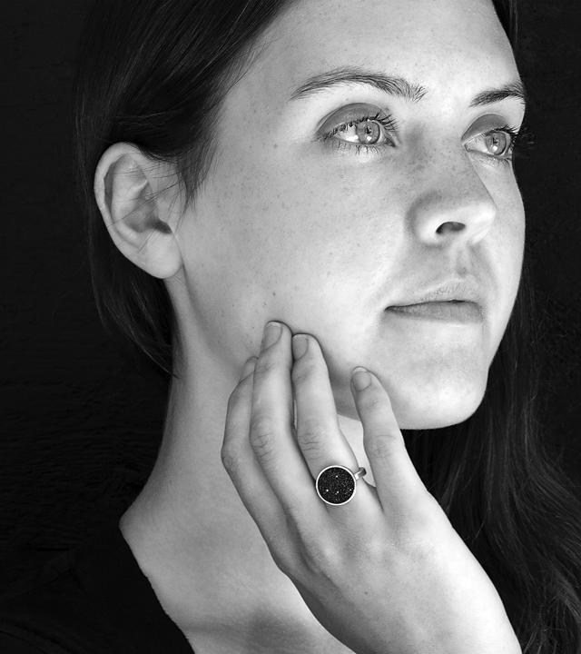 The Antares Minor concrete and diamond dust ring achieves minimalist beauty with modernist jewelry design that echoes the starry night sky.