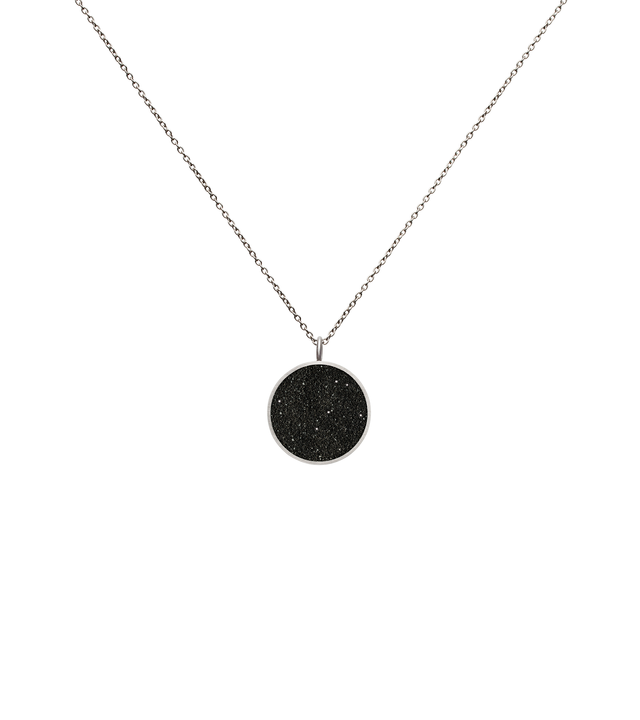 The Maia Minor concrete necklace sparkles with infused diamond dust set into stainless steel minimalist geometric form.