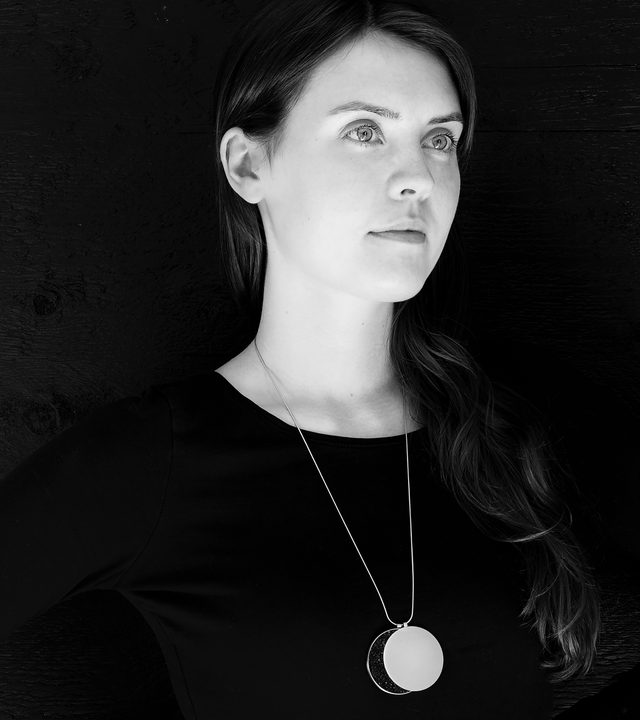 Larger overlapping double pendant in concrete, diamond dust and stainless steel hangs centred from a simple snake chain.