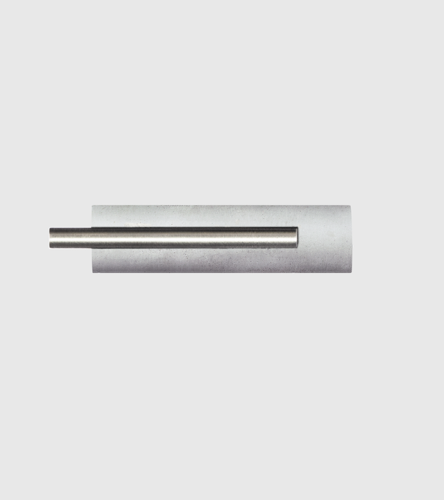 This striking Unity Tandem ring features a cylindrical concrete element set within a