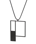 side view of minimalist sculptural black powder coated necklace with a square geometric form from the Artus collection of KONZUK