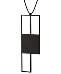 Black powder coated stainless steel sculptural statement  necklace with a rubber cord from the Artus collection called Ratio Rp7