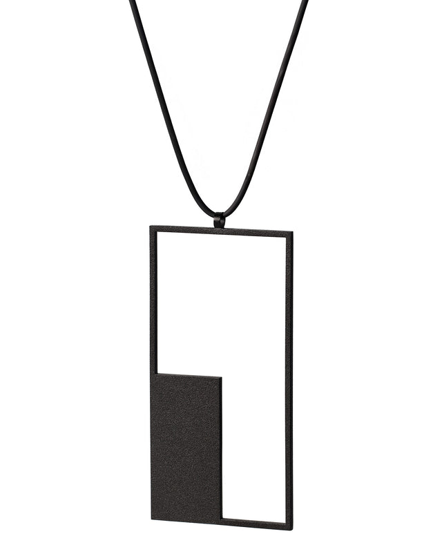 side view of a longer geometric and minimalist rectangular necklace in black powder coated stainless steel from the KONZUK Artus collection
