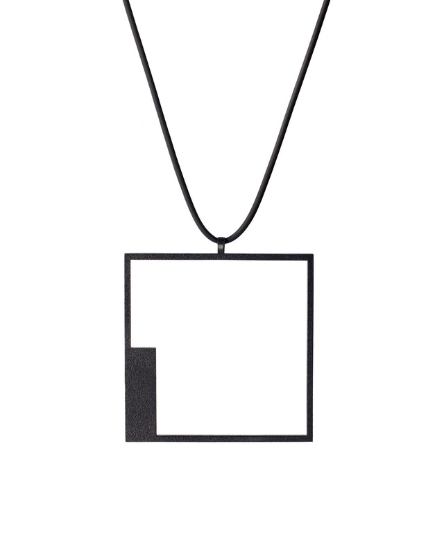 simple and elegant minimalist square pendant in black powder coated stainless steel from the KONZUK Artus collection
