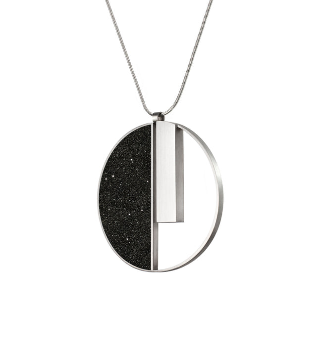 1. Pendant with circular design, inspired by Georg Muche's Bauhaus legacy. Concrete and stainless steel embody geometric elegance.  2. Georg necklace with circular silver and grey pendant, paying homage to Bauhaus legacy. Concrete and stainless steel refCircular modernist pendant inspired by Georg Muche's Bauhaus legacy. Elements necklace merges art and technology, embodying geometric elegance.