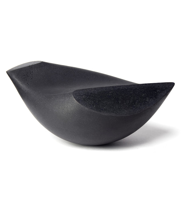 Sideview of large (Mère) Oiseau bird tabletop sculpture in black concrete.