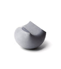 Faceview of large (Mère) Oiseau bird tabletop sculpture in charcoal grey concrete.