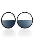 The Sola earrings feature a bold circular form that highlights the depth and tone of cast resin. Larger in scale, they create a sculptural statement while maintaining a sense of balance and simplicity. The smooth surface holds a quiet luminosity that contrasts beautifully with the dark frame, giving the design a modern yet understated presence. IN CERULEAN BLUE