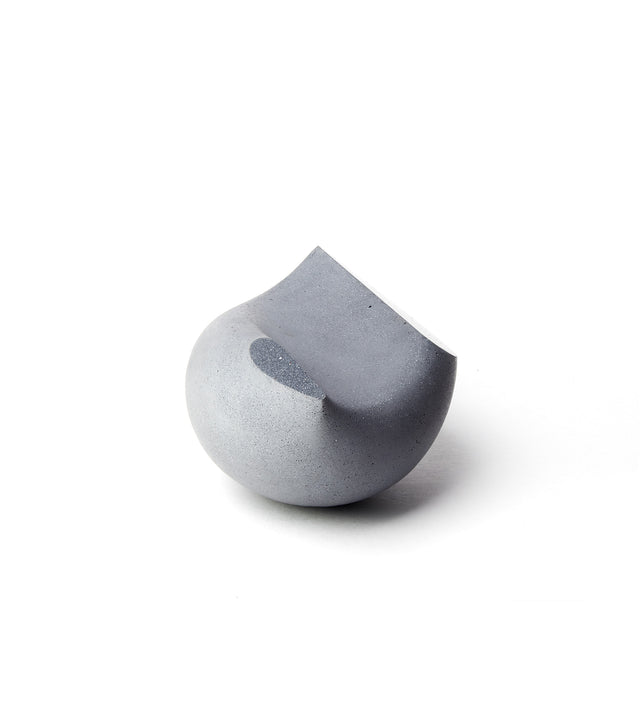 Faceview of small (Bébé) Oiseau bird tabletop sculpture in charcoal concrete.