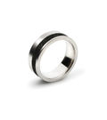 Stainless steel ring with channel of set black concrete-and-diamond dust. 