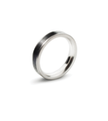 A unique wedding ring with a thin strip of black concrete is set in between stainless steel band. 