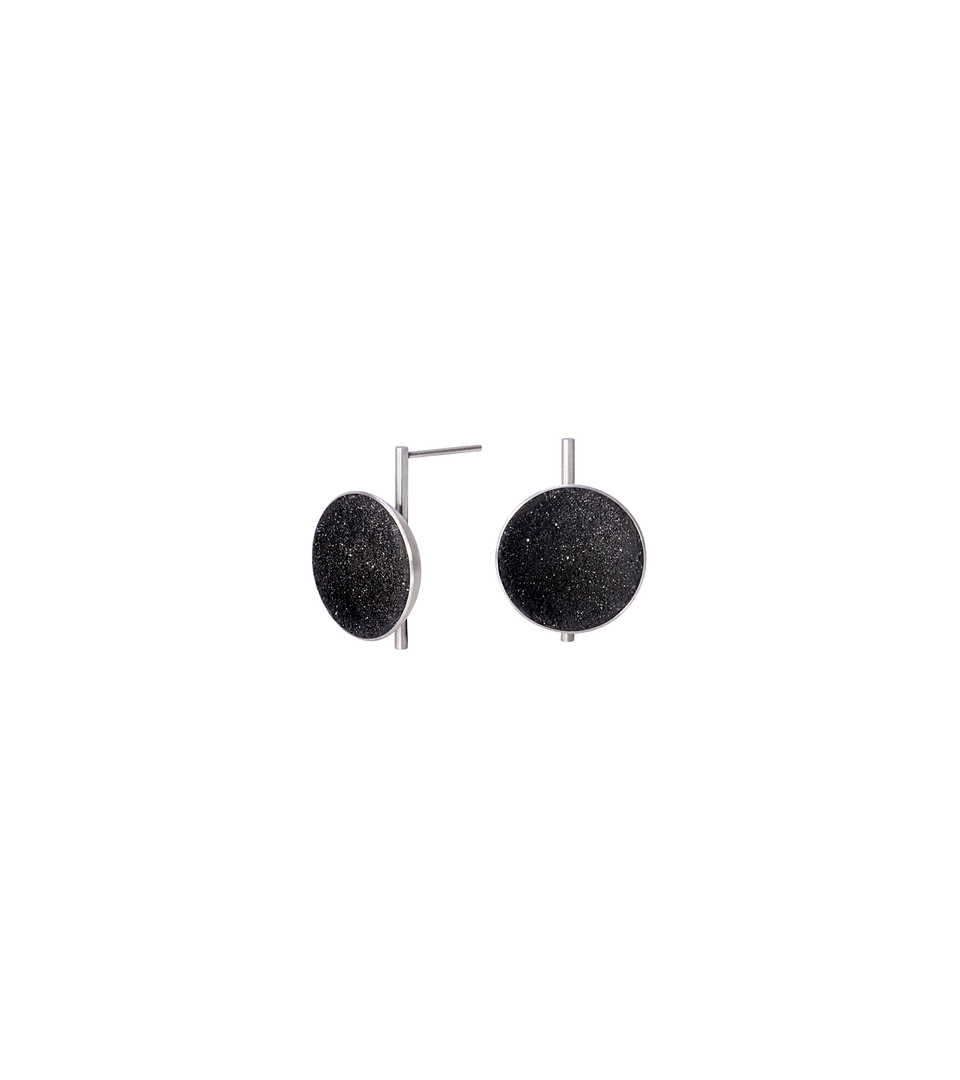 Juno earrings feature authentic diamond dust embedded into a concrete lined stainless steel dome architecturally positioned onto a minimalist steel post. 