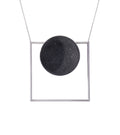 Contemporary necklace combines the geometry of a large stainless steel dome lined with the sparkle of diamond dust encrusted concrete suspended onto a minimalist steel square frame.