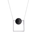 Contemporary necklace combines the geometry of a smaller stainless steel dome lined with the sparkle of diamond dust encrusted concrete suspended onto a minimalist steel square frame.