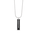 Memento Beholden pendent with black concrete set into small rectangular stainless steel design.