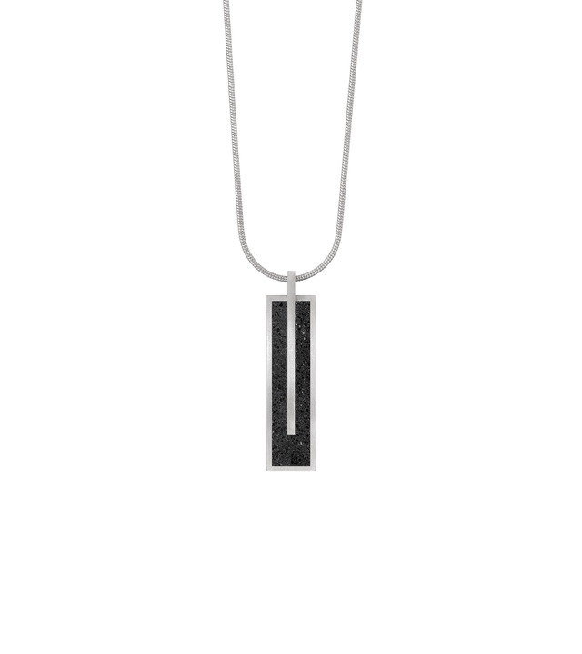 Memento Beholden pendent with black concrete set into small rectangular stainless steel design.