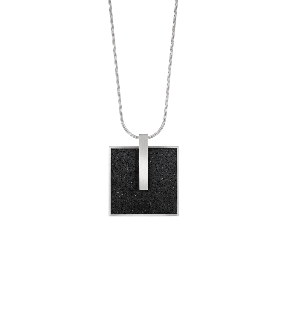 Memento Mindful locket with black concrete set into square stainless steel design.