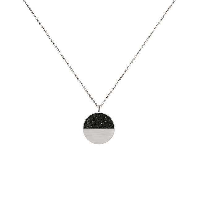 Mira minor concrete and diamond dust necklace achieves minimalist beauty with modernist jewelry design that echoes architectural principles of balance, rhythm and harmony.
