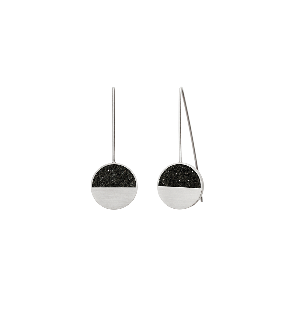 Capella Minor diamond dust infused concrete earrings balance within stainless steel geometric forms.