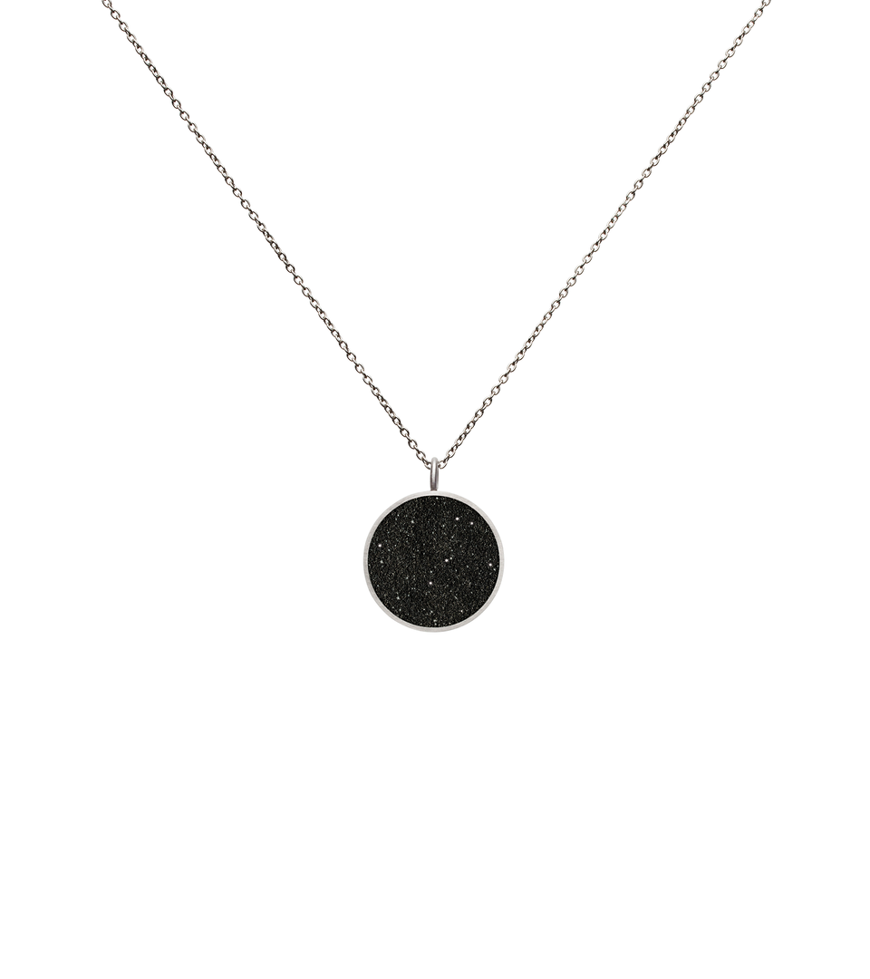 The Maia Minor concrete necklace sparkles with infused diamond dust set into stainless steel minimalist geometric form. 