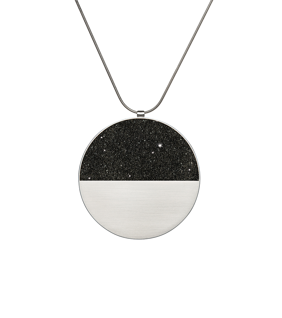 The larger sized Mira Major concrete and diamond dust necklace achieves minimalist beauty with modernist jewelry design that echoes architectural principles of balance, rhythm and harmony.