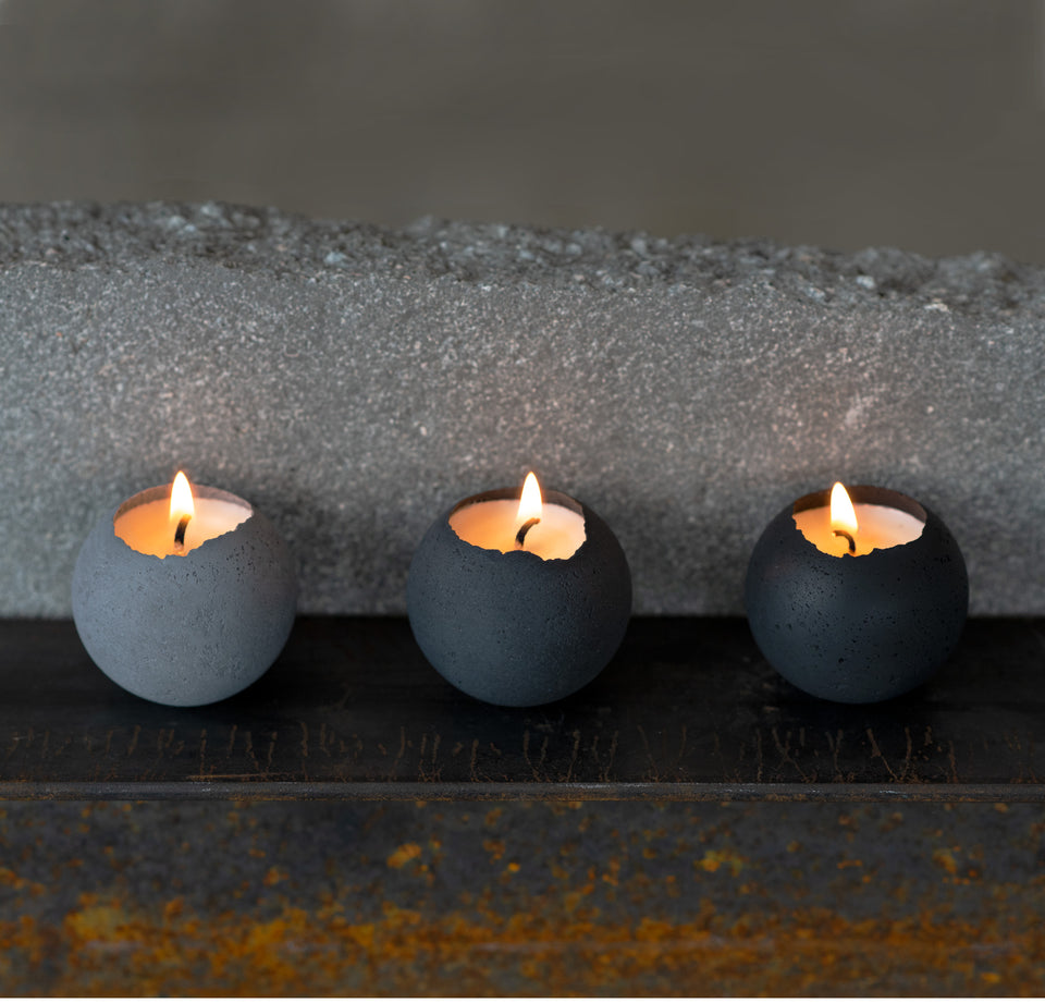 Concrete set of tealight candles in shades of grey.